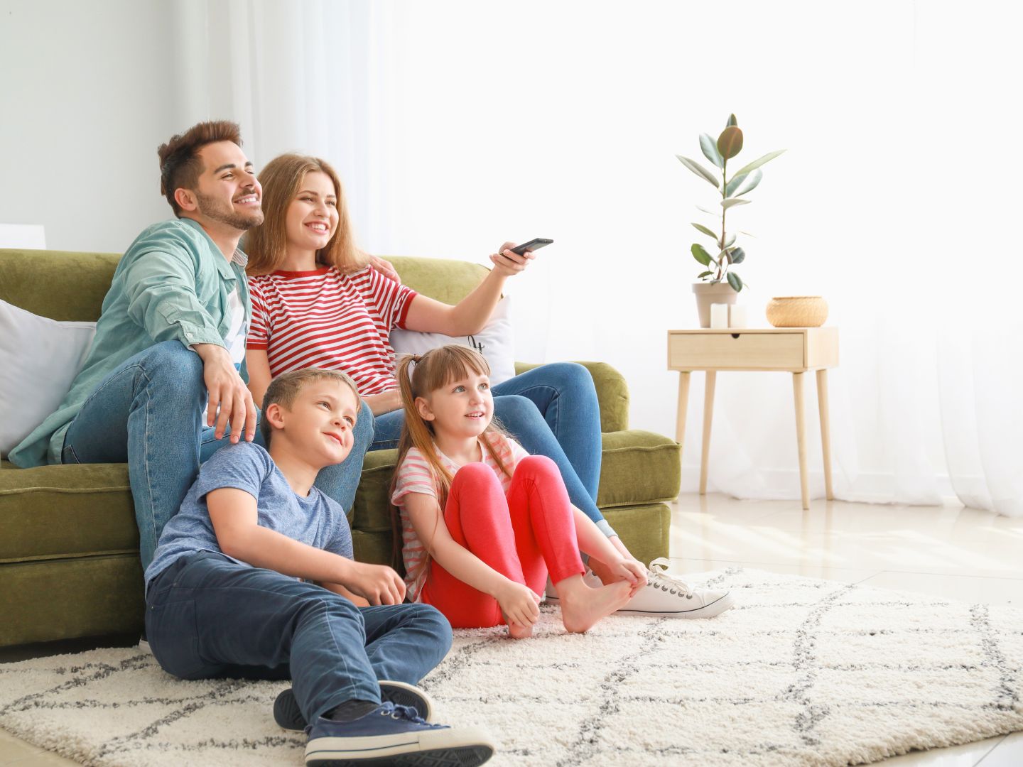 Happy family in Winnetka enjoying a clean home after professional house cleaning services by Honest Maids.